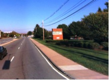 Image of a sidewalk without a buffer on Route 30.