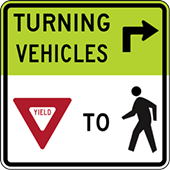 Figure 11 is a picture of an actual sign using words and icons to indicate that vehicles that are turning right need to first yield to pedestrians.