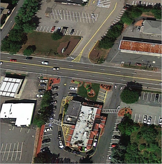 Medway Road and Driveways for Kmart and McDonald’s:
This section of text contains an aerial photograph of Medway Road at Kmart Driveway.