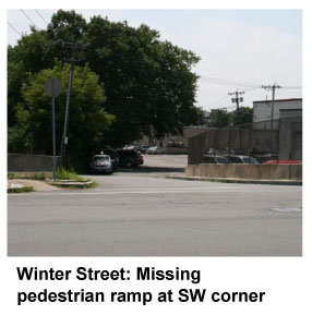 Photograph of Winter Street: Missing pedestrian ramp at SW corner 