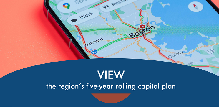 Close-up photograph of a smart phone showing traffic congestion on a map of the Boston area with text underneath reading "View the region's five-year rolling capital plan"